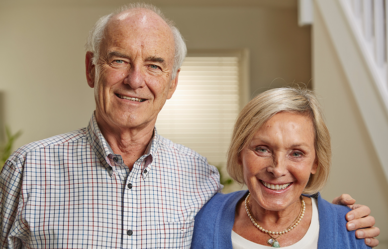 Stairlift customers smiling about their new stairlift